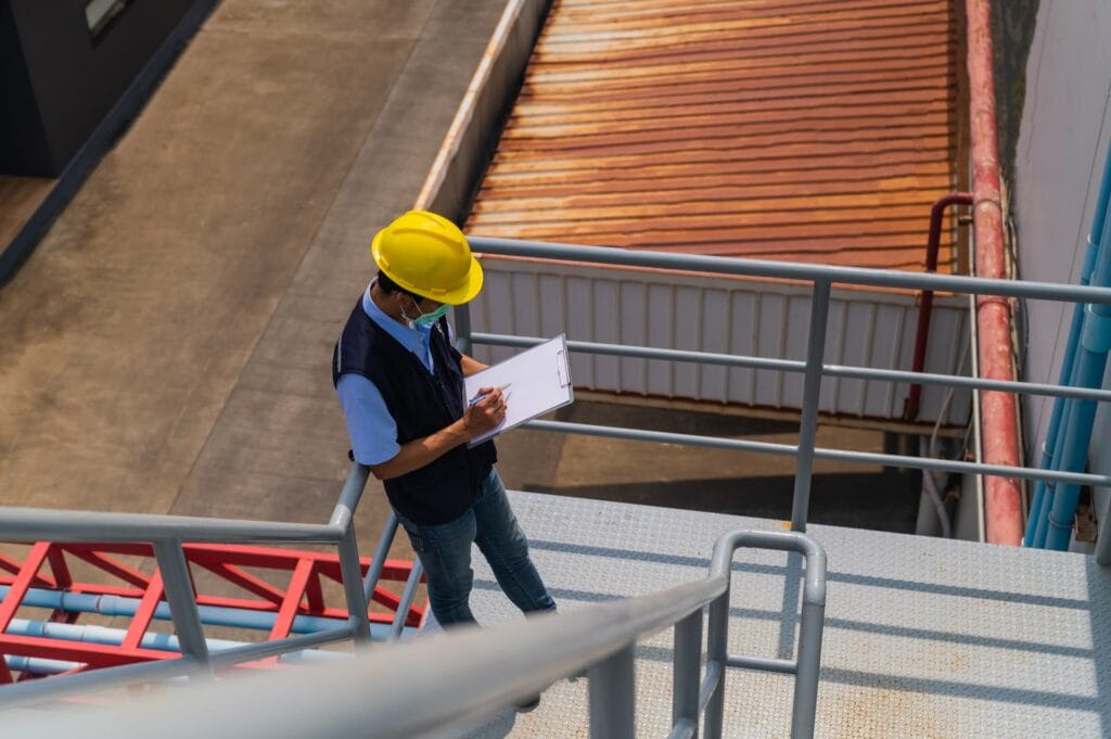 Procheck engineers carrying out a workplace safety inspection in Ireland