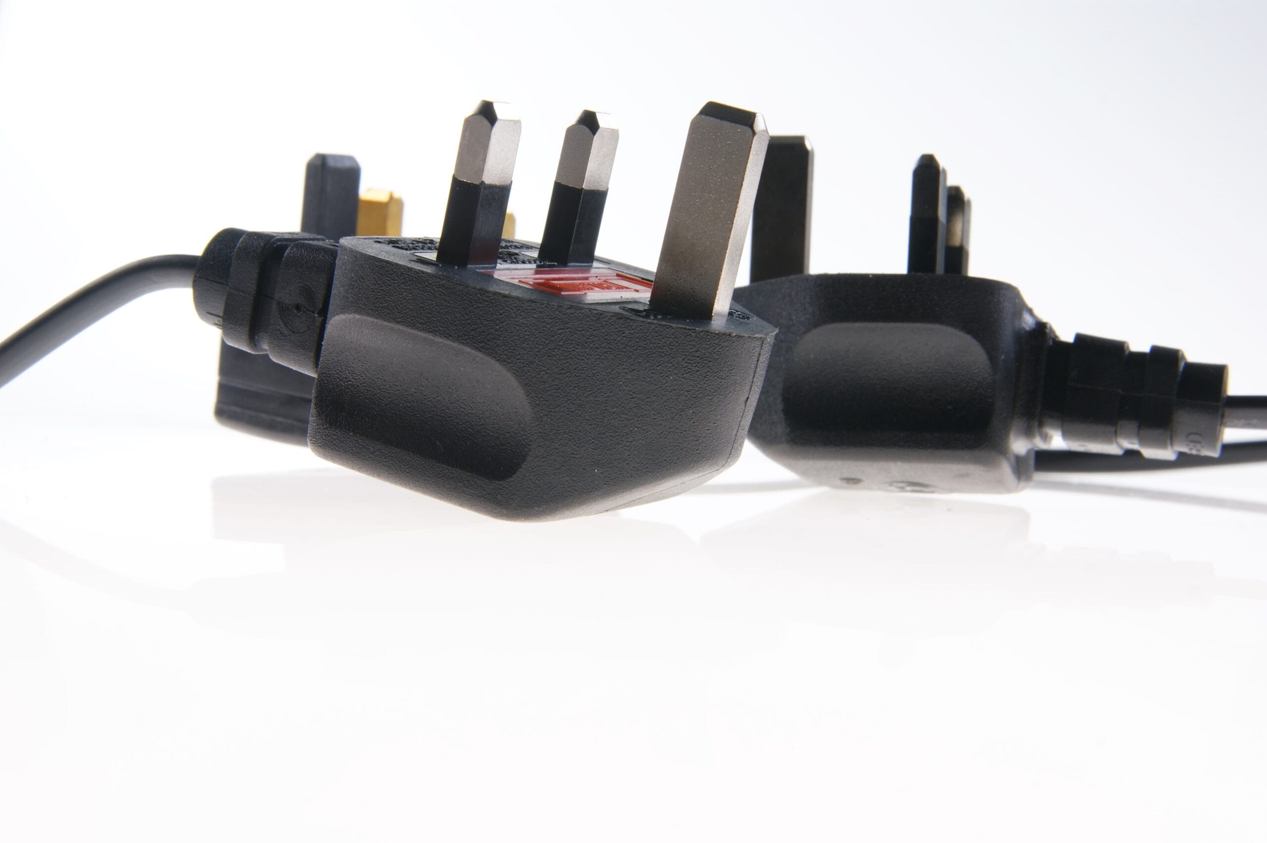 vecteezy_two-black-plugs-with-one-plugged-into-the-wall_30724482 (1) how often PAT testing Ireland portable appliance test label